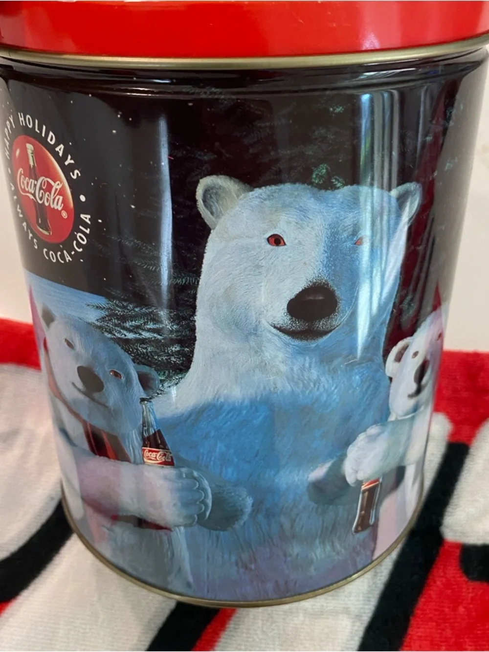 Coca Cola tin and towel, collectable
